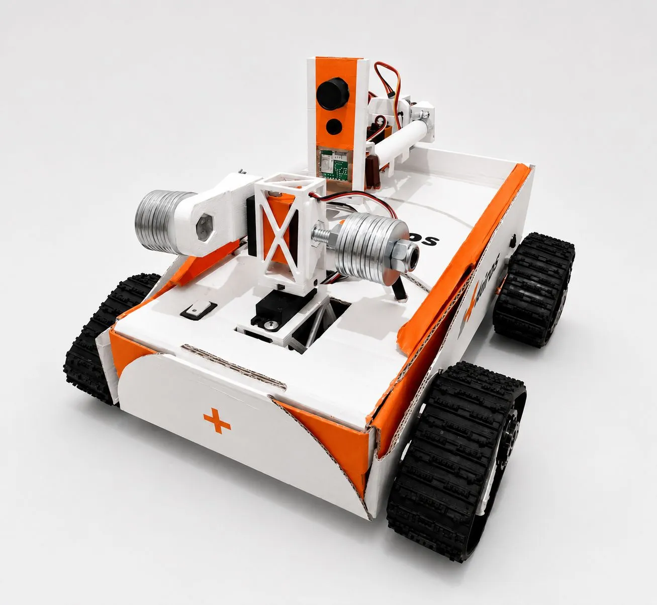 The robot from the front, its arm folded over the cardboard body